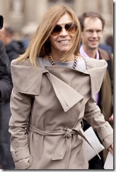 Carine Roitfeld in trench and TF sunglasses