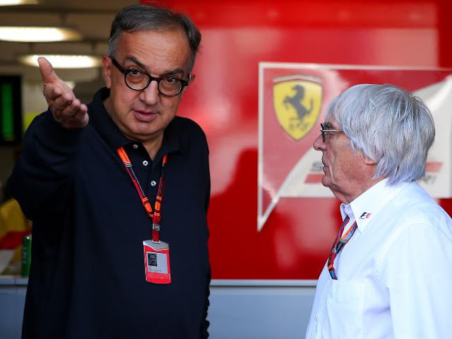 Marchionne engaging in discussion with Ecclestone at Monza in 2015.Source:Getty Images