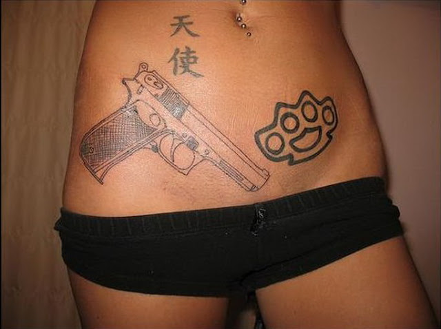 Gun Tattoos On Waist. gun tattoos on waist.