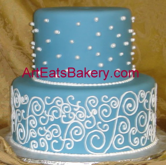 Two tier custom designed blue fondant unique pearls and curlicues wedding 