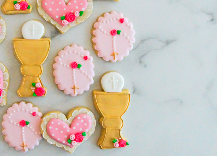 pink first communion decorated cookies