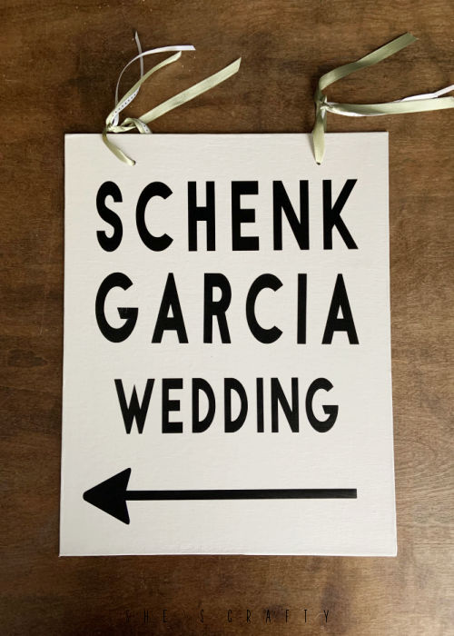 Wedding direction signs on canvas.