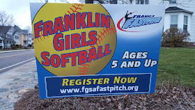 lawn sign touting the Franklin softball registration 