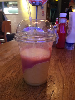 The banana strawberry smoothie from giraffe stop London England