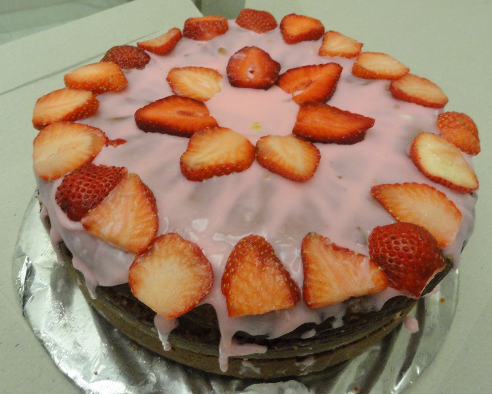 chocolate cake with chocolate frosting and strawberries  Vanilla Sponge Cake with Strawberries and White Chocolate Icing