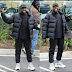 Kanye West smiles at the Paparazzi as they congratulate him on birth of his third child