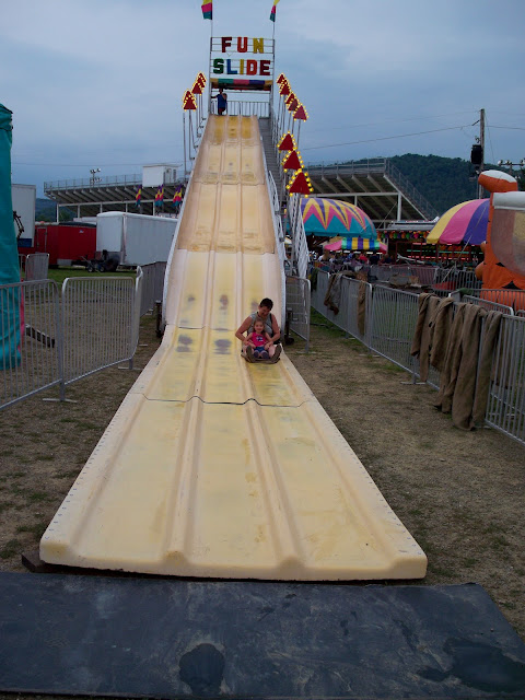 two year old and grammie on the fun slide