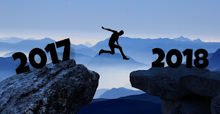 Person jumping between 2017 and 2018