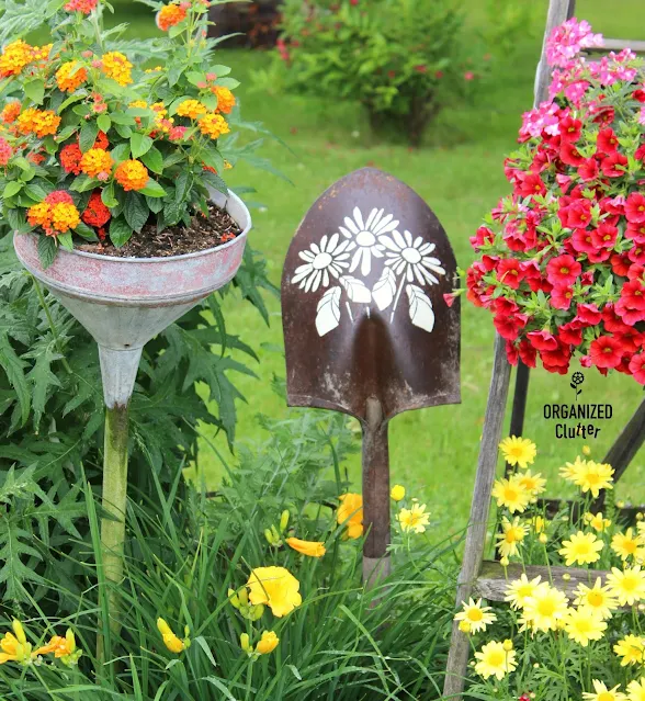 Photo of a stenciled shovel head for the garden.