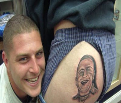 Getting a tattoo of your best buddies face on your ass is taking stupidity 