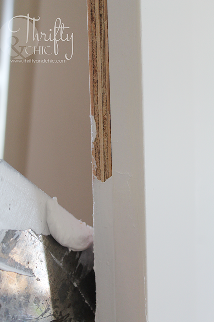 DIY barn door tutorial for sliding double barn doors! Make one of these doors for under $70!