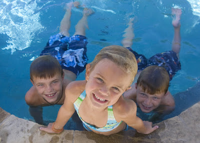 Southlake Texas photography pictures of family in their pool at their home