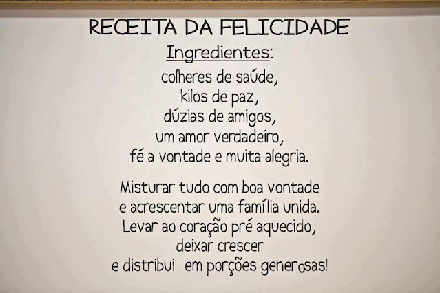 A imagem destaca a receita da felicidade, escrita de forma elegante e inspiradora em um fundo branco, transmitindo a mensagem de que a verdadeira felicidade está ao alcance de todos. Um convite para buscar a alegria nas pequenas coisas da vida e cultivar momentos de gratidão e amor.