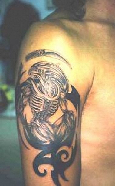 tribal alien tattoo