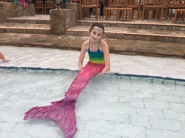 sasha with pink mermaid tail on