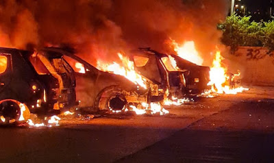 Cars burned during riots in Lod