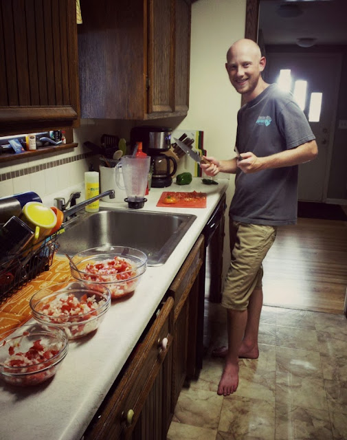 roy slaved away in the kitchen making delicious homegrown salsa