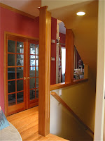 Looking from family room towards den and entry.