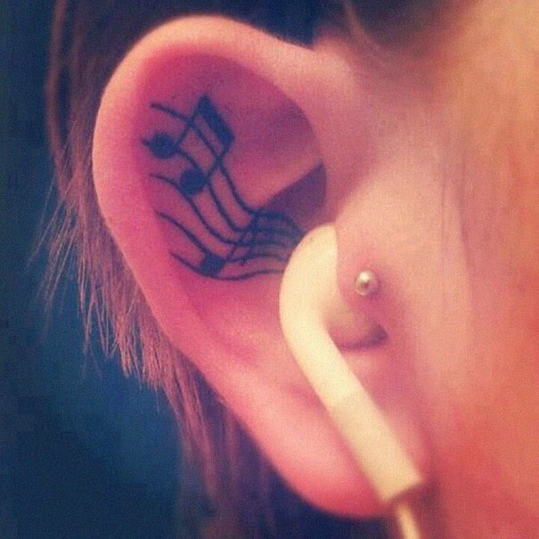 http://www.musiccrowns.org/art/musical-note-ear-tattoo/