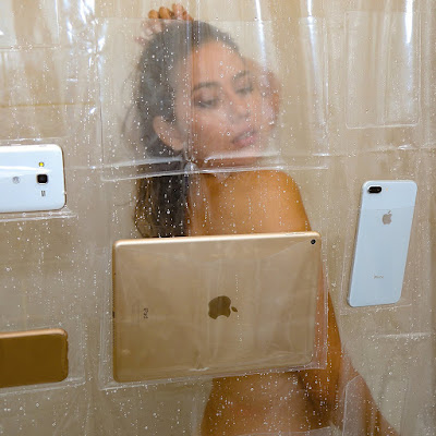 Now, You Can Interact With Your Phones In Shower Without Worry Of Being Damaged, By Using This Shower Curtain With Pockets