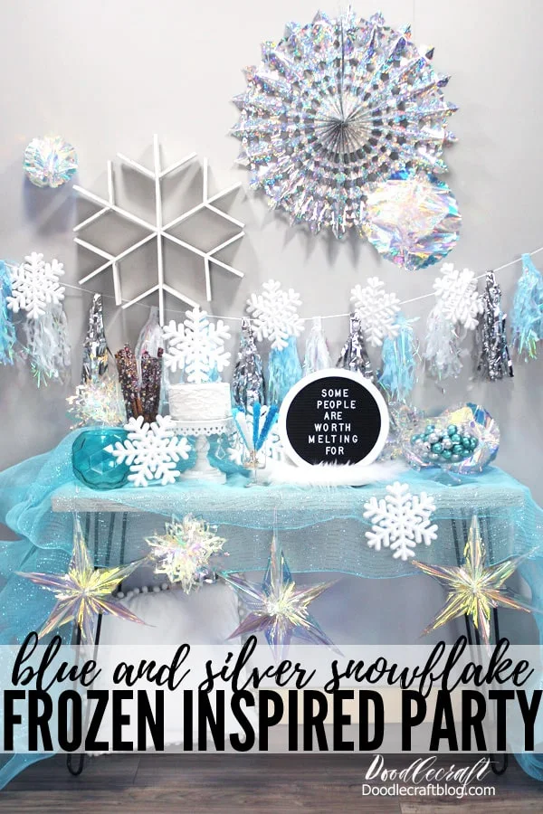 Frozen birthday party with silver and blue snowflakes, iridescent decorations, textures and lots of yummy food...plus becomes holiday decor for the Christmas tree after the party.