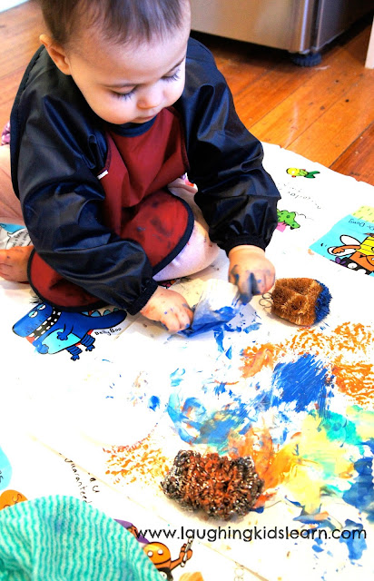 Printing and painting with kitchen cleaners. Great sensory activity for children. 