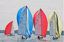 J/70 one-design sailboats- sailing downwind under spinnaker