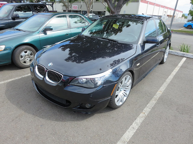 BMW 550i after bumper, engine shield and support bracket replaced.