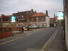 Cars parked on the land near Cross Street, Brigg, for which an application has been made to erect three dwellings - see Nigel Fisher's Brigg Blog