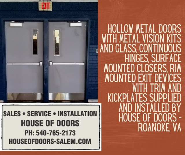 Hollow metal doors with metal vision kits and glass, continuous hinges, surface mounted closers, rim mounted exit devices with trim and kickplates supplied and installed by House of Doors - Roanoke, VA