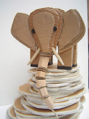 http://www.madeinslant.com/2011/06/alessandra-fiordaliso-upcycles-cardboard-into-creature-art/