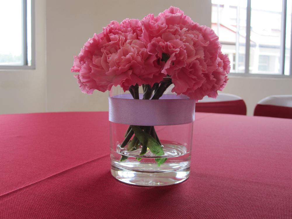 last but not least bushy pink carnation as centerpiece