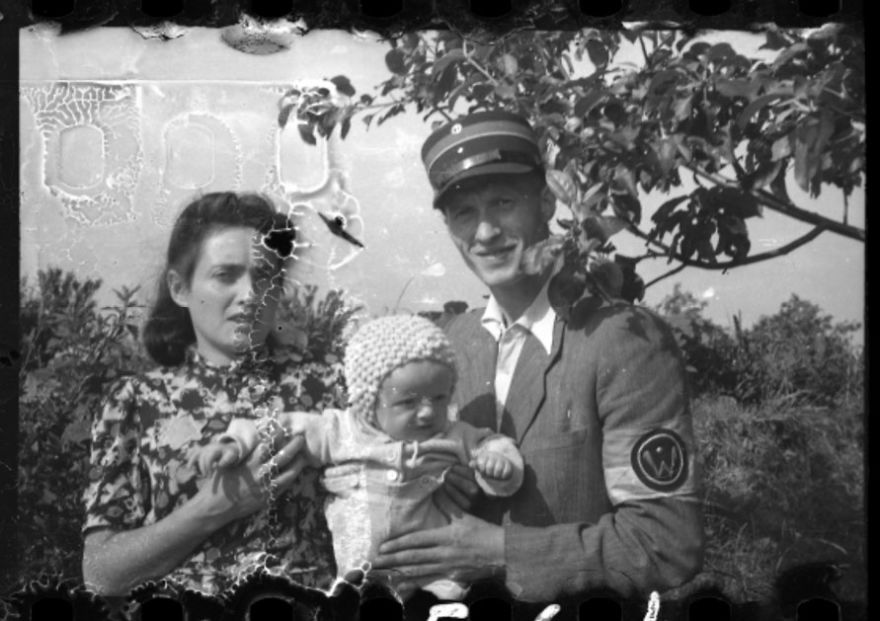 These 32 Pictures Had Been Buried For Years. The Reason Is Heart-Breaking - 1940-1944: A Jewish Policeman With His Wife And Child In Marysin