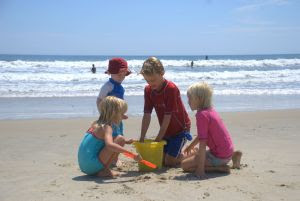 Kids on Family Beach Vacation 2 - Family at the beach. Stock Photo credit: hortongrou