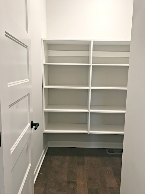 walk in pantry with melamine shelves
