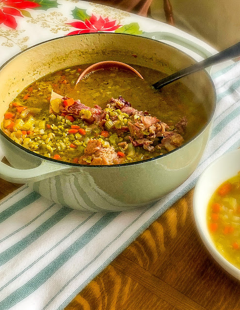 Hearty Split Pea Soup is made with a meaty hambone, generous carrots, onions, and celery, yielding a flavorful broth.  It is easy to make on the stovetop, but I have added a slow cooker and instant pot option.