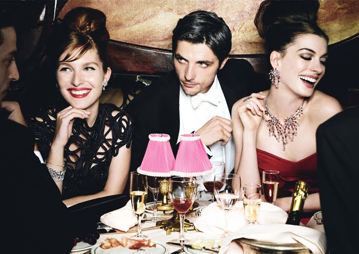 The actress, with Raphaël Personnaz and Josephine de la Baume at Maxim's.