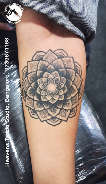 http://heavenstattoobangalore.in/geomatric-flower-tattoo-at-heavens-tattoo-studio-bangalore/