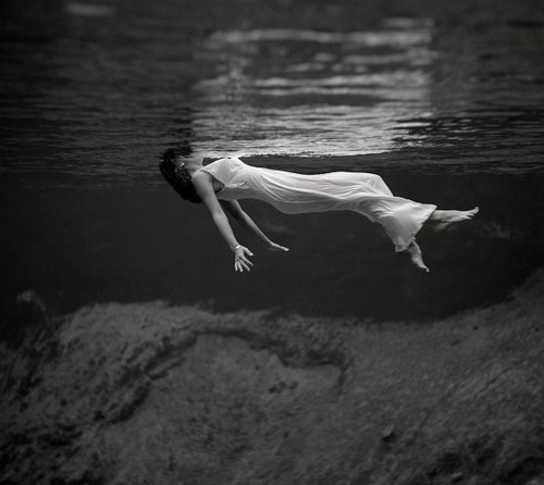 Woman Floating in Water