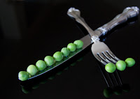 fork and knife with peas