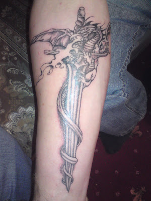 Sword and dragon tattoo