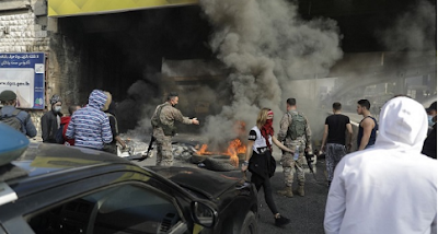 Angry Lebanon protesters block roads over poverty