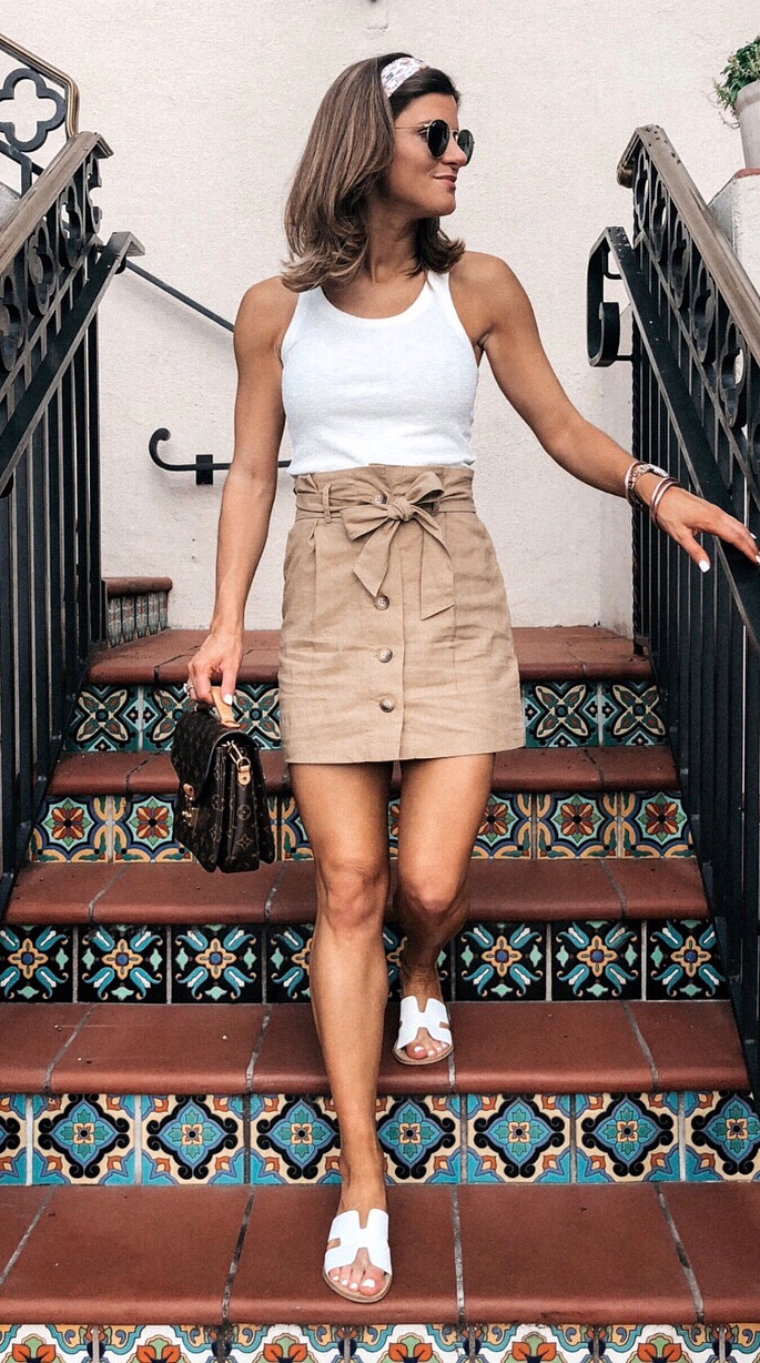 stylish look | beige skirt + white top + bag + slides