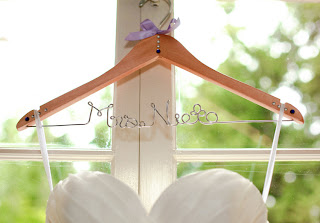 Mrs. Nieto add to Patricia's hanger for her wedding dress