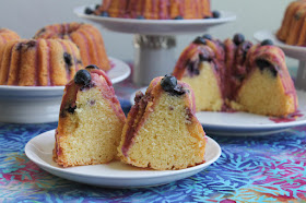 Food Lust People Love: Tender peachy crumb is perfectly complemented by the juicy blueberries with a hint of rosé wine in this buttery pound cake I’m calling Peach Rosé Blueberry Bundt. You can bake it as one cake in a 10-cup pan or as mini and small Bundts for sharing.