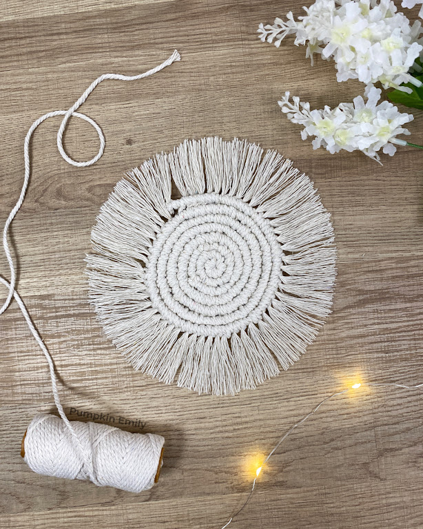 The above look of a macrame coaster.