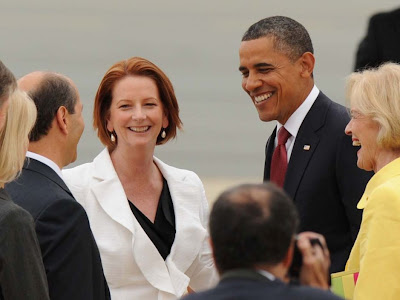 Julia Gillard and Barack Obama meeting and smiling in Australia