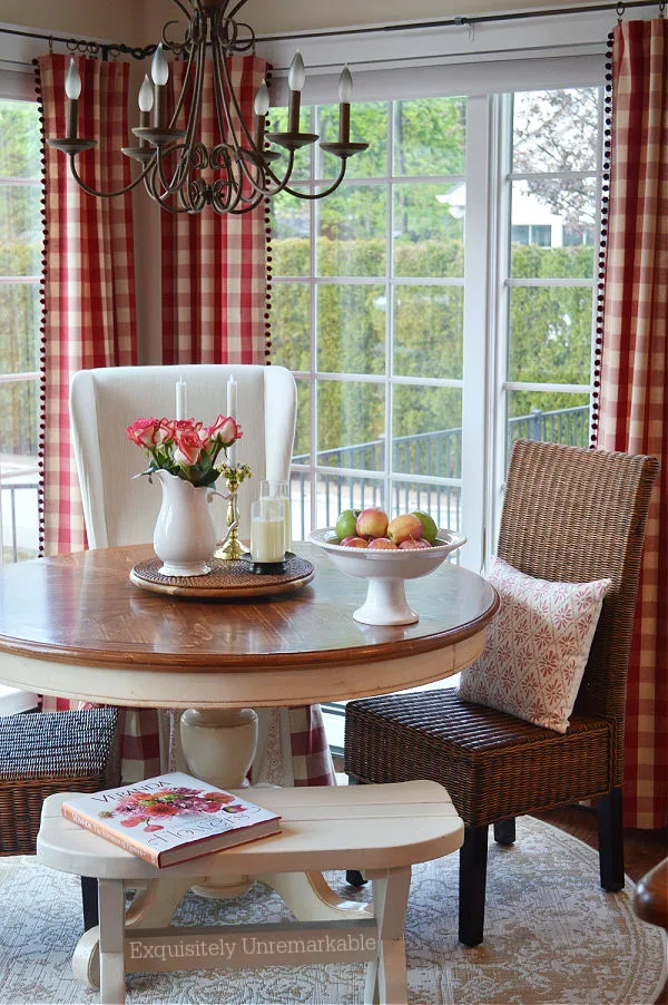 Cottage Style Kitchen Nook with pom pom trim curtains