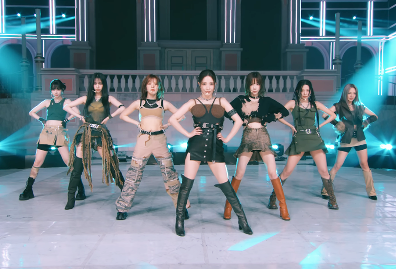 GOT The Beat [From Left to Right: Winter, Karina Wendy, BoA, Taeyeon, Seulgi, Hyoyeon] stood in formation whilst performing “Stamp On It” at the SM Town Live 2023: SMCU Palace, on a set which features a white palace behind them.