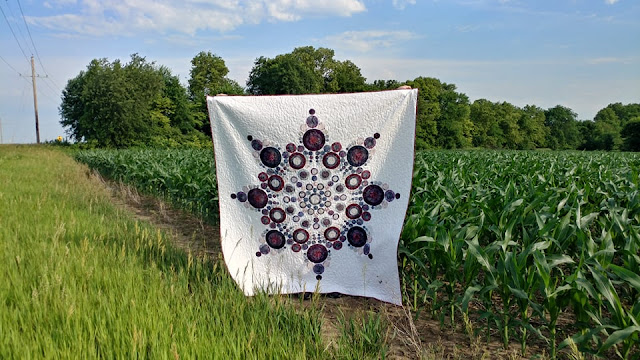 Flurry quilt - giant modern snowflake quilt with raw edge applique